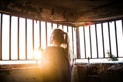 woman behind the bars